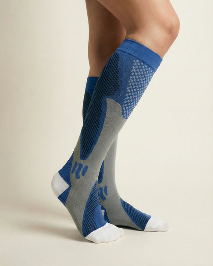 Blue and gray knee-high socks on a beige background