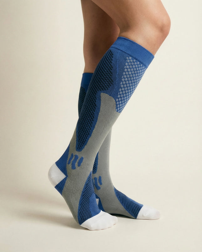 Blue and gray knee-high socks on a beige background