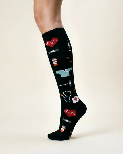 Black knee-high sock with colorful medical icon design on a white background